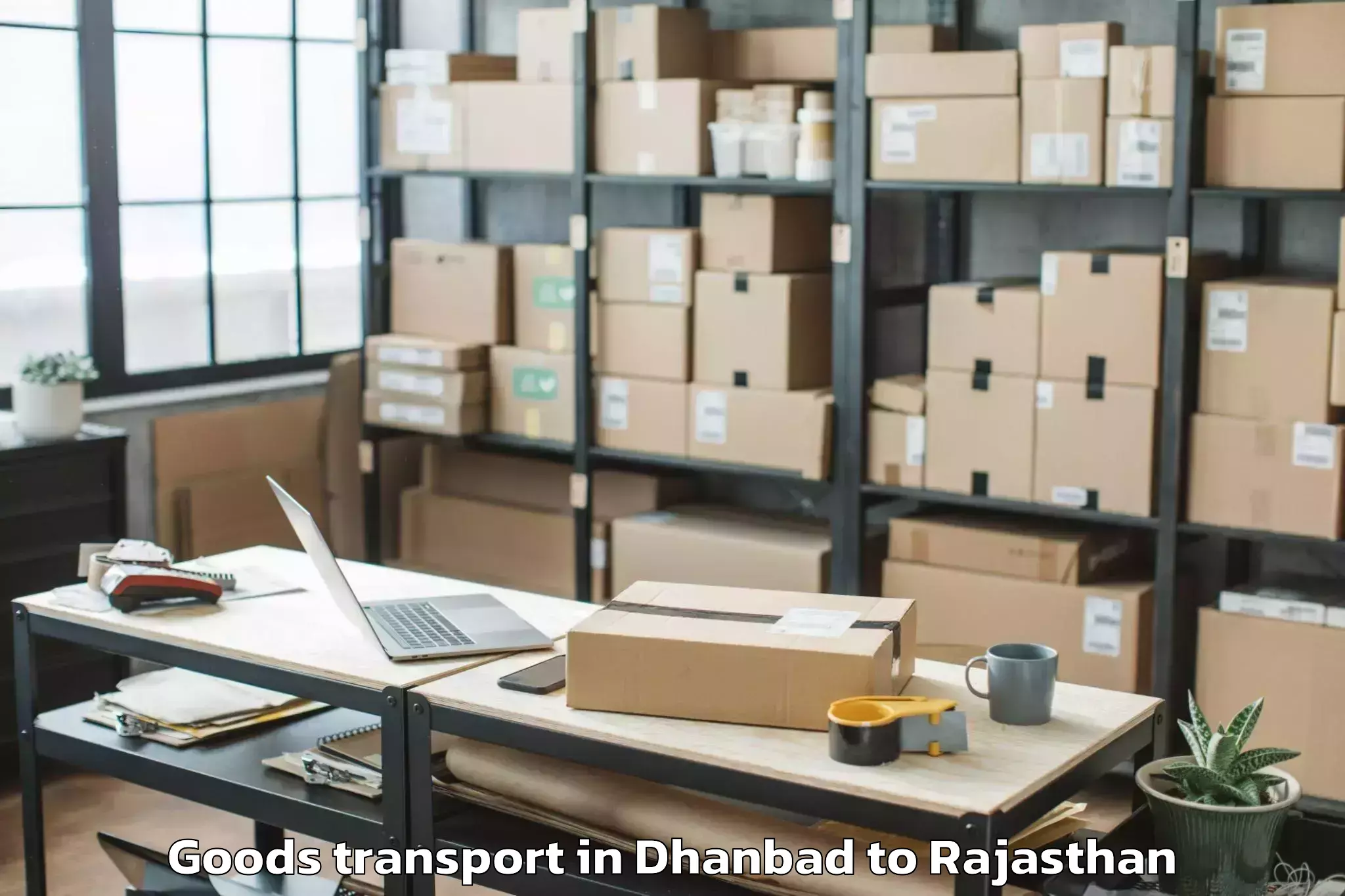 Book Dhanbad to Banasthali Vidyapith Goods Transport